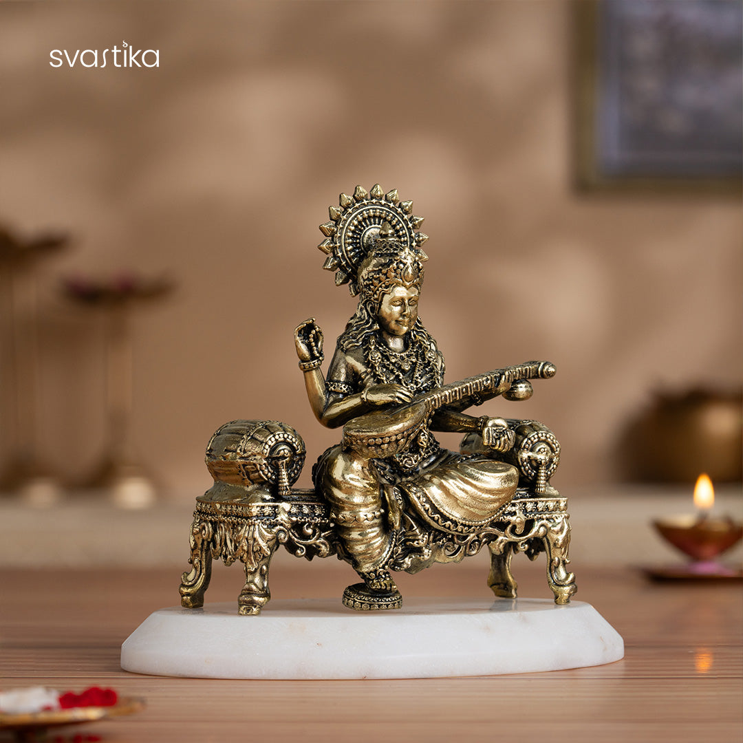 Brass Saraswati Idol Playing Veena On Singhasan (4 Inch)