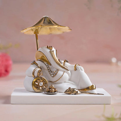 Ganesh Idol Under Divine Shelter