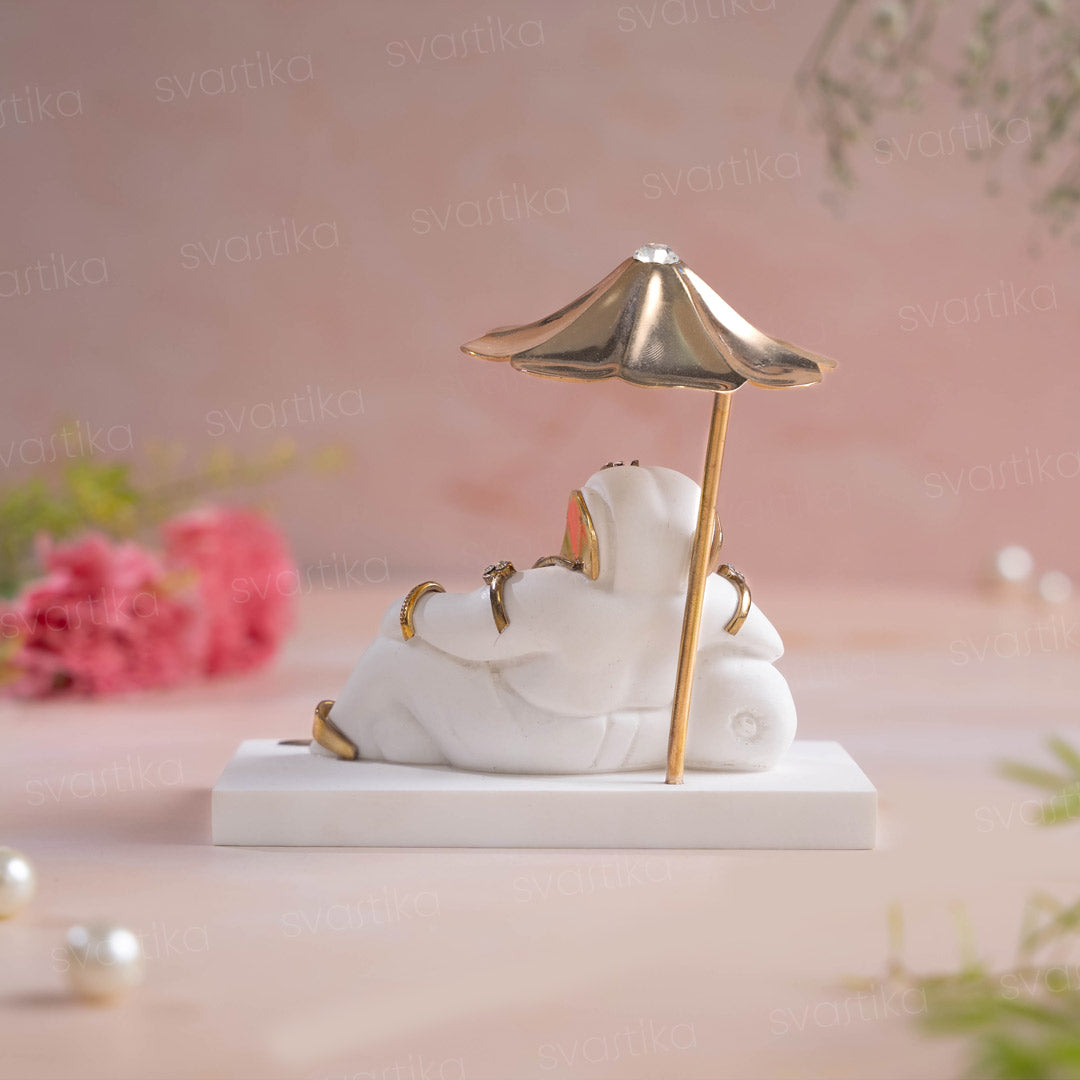 Ganesh Idol Under Divine Shelter