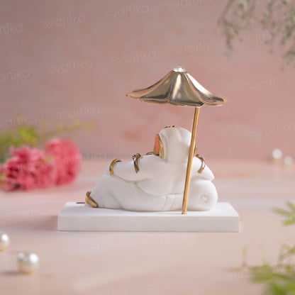 Ganesh Idol Under Divine Shelter