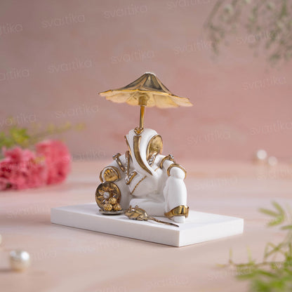 Ganesh Idol Under Divine Shelter