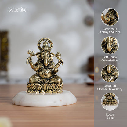 Brass Left-Trunk Ganesha Murti Sitting On Lotus (3 Inch)