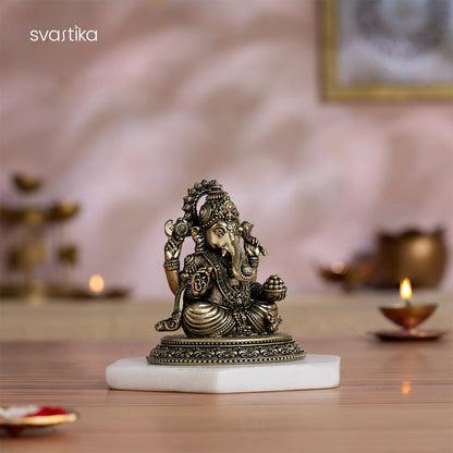 Svastika Brass Sitting Ganesha Murti (4 Inch)
