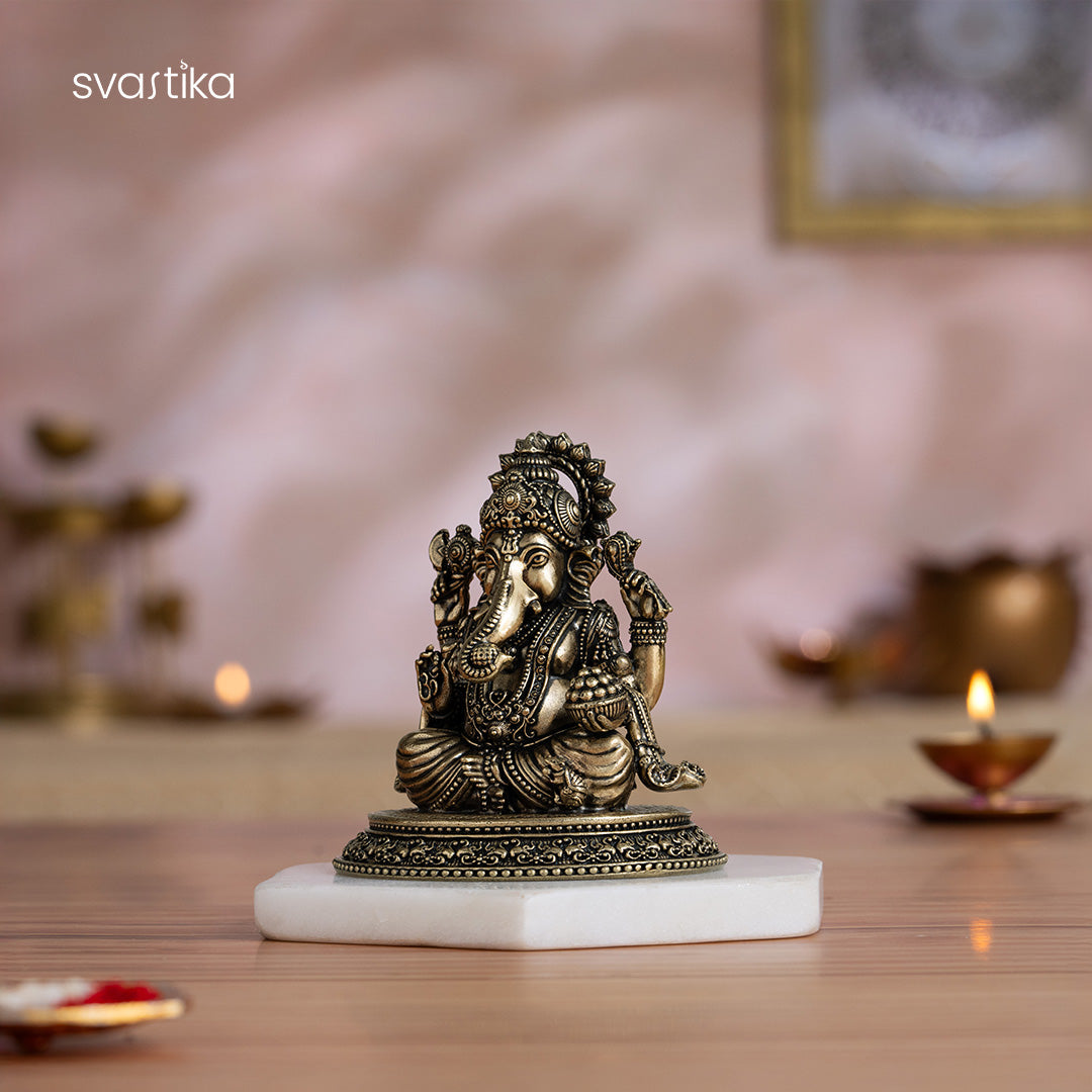 Svastika Brass Sitting Ganesha Murti (4 Inch)