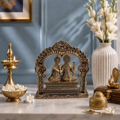 Brass Lakshmi Narayan Murti Seated Under Carved Arch (5 Inch)
